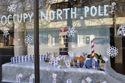 First Place Winner: "People for the Ethical Treatment of Elves," the theme of the window is Occupy North Pole. (Photo Courtesy of: East End Arts)