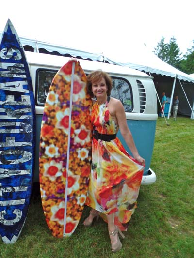 A guest whose dress matched the surfboard.  Photo by:  Katlean de Monchy