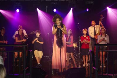 Young members of the cast of Broadways Matilda join Grammy Award Winner Macy Gray on stage at Tuesdays Childrens Annual Gala at the Lighthouse at Chelsea Piers on September 6th, 2012