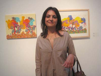 08-19-11 Artist Avani R. Patel with her art at "Erasing Borders: Exhibition of Contemporary Indian Art of the Diaspora" at Aicon Gallery. 35 Great Bond St. Thursday night 08-18-11