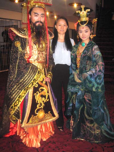 08-29-13  Dr. Xiuli Meng (center) with two models dressed in costumes of "The Legend of Emperor Qin" at a press conference at the Minskoff Theatre. 200 West 45th St. 08-28-13.  photo by:  aubrey reuben