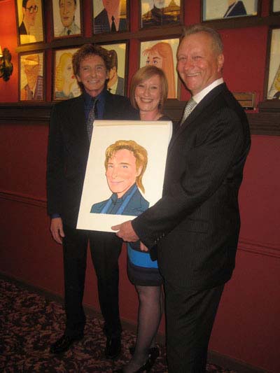 02-15-13 (L-R) Barry Manilow. Heather Hitchens. Max Klimavicius at the presentation of a caricature to Barry Manilow at Sardi's. 234 West 44th St. Thursday afternoon 02-14-13