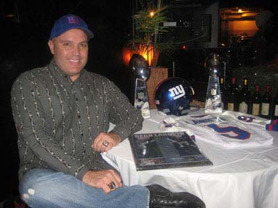 02-03-12 Former NY Giant Sean Landeta with his Super Bowl memorabilia from 1987 and 1991 at a special appearance for fans and media at Empire Steak House. 36 West 52nd St. Wednesday night 02-01-12