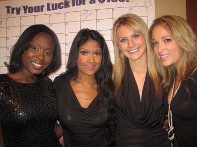 01-04-12 Hooters (L-R) Sadiya Babb. Jasmine Syed. Alex Chesnul. Meagan Cyr at the auction table at the Muscular Dystrophy Association's (MDA) 15th Annual Muscle Team Gala & Benefit Auction at Pier 90. Chelsea Piers. Hudson River & 23rd St, Tuesday night 01-03-12