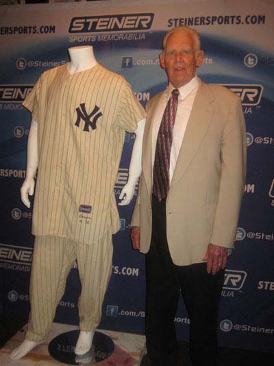 06-29-12 Don Larson and the uniform he wore from the 1956 perfect game. which goes on the auction block on Steiner Legends Auction at a press conference at Gallagher's Steak House.228 West 52nd St. Thursday afternoon 06-28-12