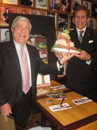 05-18-12 Brooklyn Borough President Marty Markowitz (L) proclaims "A Jew Grows in Brooklyn" day to Jake Ehrenreich who is starring in his Off-Broadway comedy musical of the same name. Ehrenreich also received a new sandwich in his show's name which is added to the menu at the Carnegie Deli. 854 Seventh Ave. Thursday morning. 05-17-12