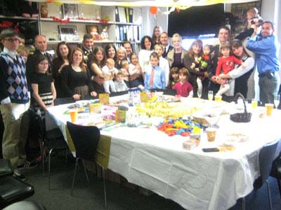 11-25-11 Patricia Kennedy (blonde lady eigth right) hosts Iraq. Afghanistan & Vietnam injured veterans and their families at a Macy' Thanksgiving Parade Viewing & Brunch at Careers Transition for Dancers Headquarters. 165 West 46th St. Thursday morning 11-24-11