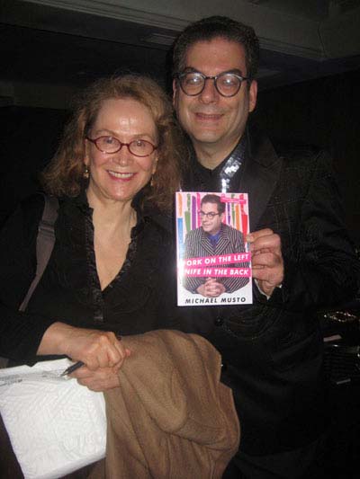 09-18-11 An unidentified fan poses with Michael Musto at a party for his book "Fork on the Left. Knife in theBack" at Copacabana. 268 West 47th St. Monday night 09-17-11