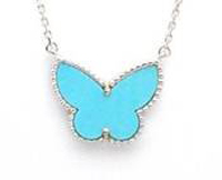 Lucky Alhambra butterfly pendant in turquoise and 18K white gold  from the iconic Van Cleef & Arpels ALHAMBRA collection