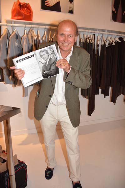 Christophe HoHenberg with photo Portrait of Bobby Kennedy Jr.Photo by:  Rose Billings/Blacktiemagazine.com