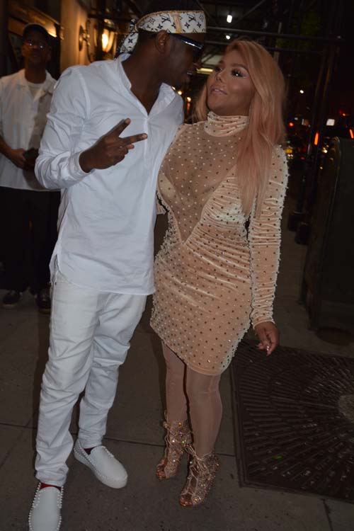 Lil'Kim and Larry at after Party for P Daddy.  Photo by:  Rose Billings/Blacktiemagazine.com