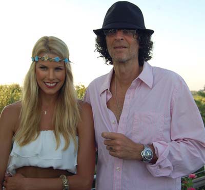 Beth Ostrosky Stern and Howard Stern at the 2011 GET WILD! Summer Gala to benefit the Evelyn Alexander Wildlife Rescue Center of the Hamptons.  Photo By: Rob Rich