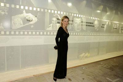 Janna Bullock standing in front of her exhibition