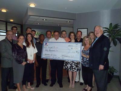 McGladrey employees pose with Mandy O'Neill to present $50,000 to LeukemiaTexas