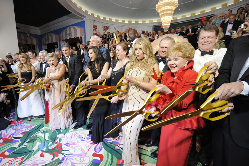 Honored guests at last weeks grand opening at The Greenbrier participate in the ribbon cutting ceremony, marking the official opening of the new Casino Club in White Sulphur Springs, WV. (Photo by Isaak Sasha) 