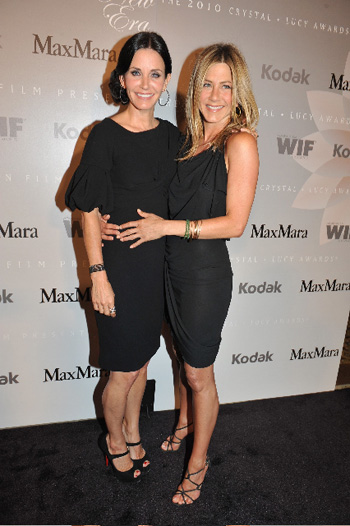 Courteney Cox  Max Mara Elegante Black Dress with Voluminous Sleeves and Jennifer Aniston