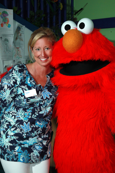 Susie Dwinell, vice president and client and community relations director for PNC Bank with Elmo 