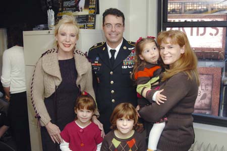 Patricia Kennedy with Master  Sgt Jason Leach, wife Kimberly 