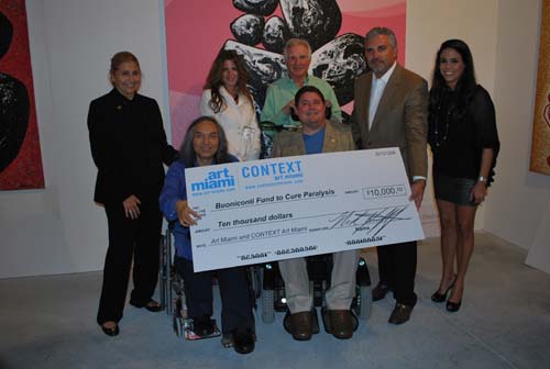 Suzanne M. Sayfie, Artist Ma Desheng, Pamela Cohen, Nick Buoniconti, Marc Buoniconti, Nick Korniloff and Stephanie Sayfie Aagaard at The Buoniconti Fund Reception to benefit The Miami Project to Cure Paralysis at Art Miami. Photo by Getty Images