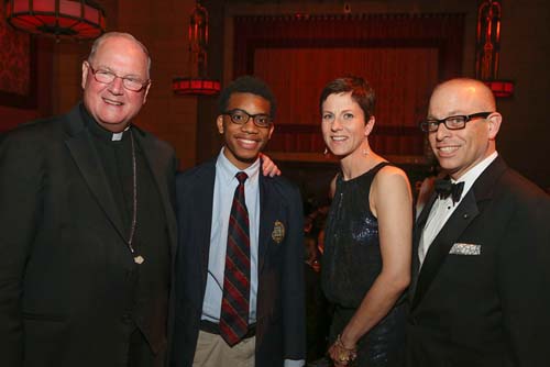 His Eminence, Timothy Michael Cardinal Dolan, Tyreece Santana, Joy Millette, Michael Millette. Photo by: Joe Vericker   