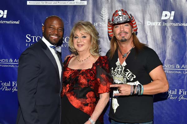 Emcee Taye Diggs, ABCs President Gloria Gebbia, performer Bret Michaels