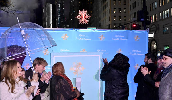  Shannan Ferry, Stonbely family, Christine Stonbely, Daniel Boulud, Angel Blue and Alex Bores flip the switch during the 2024 Fifth Avenue Snowflake Illumination Ceremony hosted by Fifth Avenue Snowflake Foundation 