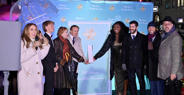  Shannan Ferry, Stonbely family, Christine Stonbely, Daniel Boulud, Angel Blue and Alex Bores flip the switch during the 2024 Fifth Avenue Snowflake Illumination Ceremony