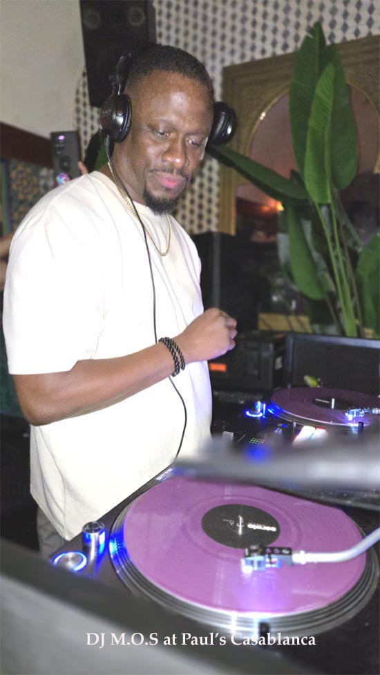 DJ M.O.S at Paul's Casablanca.  Photo by: Rose Billings Black Tie International Magazine