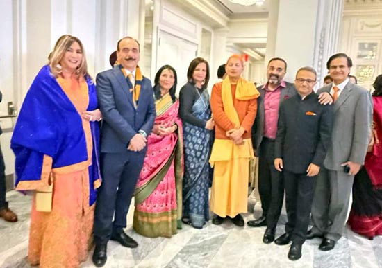 Meera Gandhi with  the Head of Venta Society USA surrounded byi
