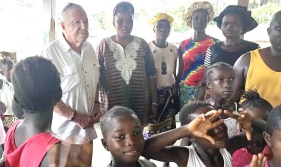 Africa Day at the UN,  Gary Shultz and children in the orphanage he founded