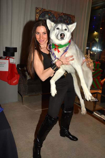 Caroline Loevner and her Dog Beau.  photo by:  rose bilings/blacktiemagazine.com