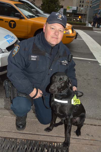 Officer Vinnie Ewart and his dog Curtin .  photo by:  rose billings