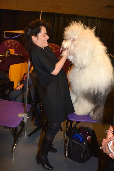 Parker Posey and Old English Sheep Dog real contact made.  Photo by:  Rose Billings/Blacktiemagazine.com