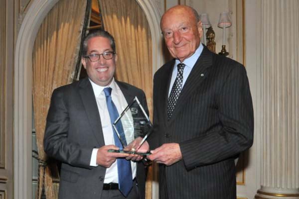  Marc D. Taub (Left) is presented with the Wine Leader Award by Lucio Caputo.