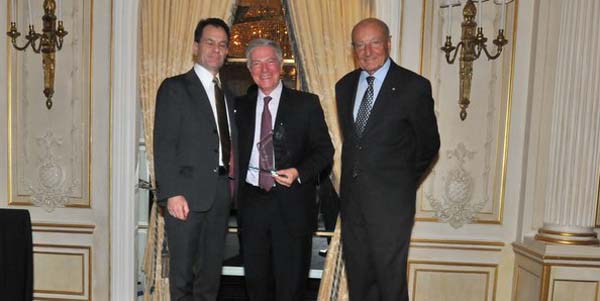 Italian Trade Commissioner Maurizio Forte (Left) and Lucio Caputo present the Wine Leader Award to Piero Selvaggio (Center).