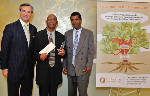 Mr. William A. Meyer, Quantum Foundation Board Chair, with grant recipients Julien & Jean Jeudy of Alliance Primitive Ministries  based in Delray Beach